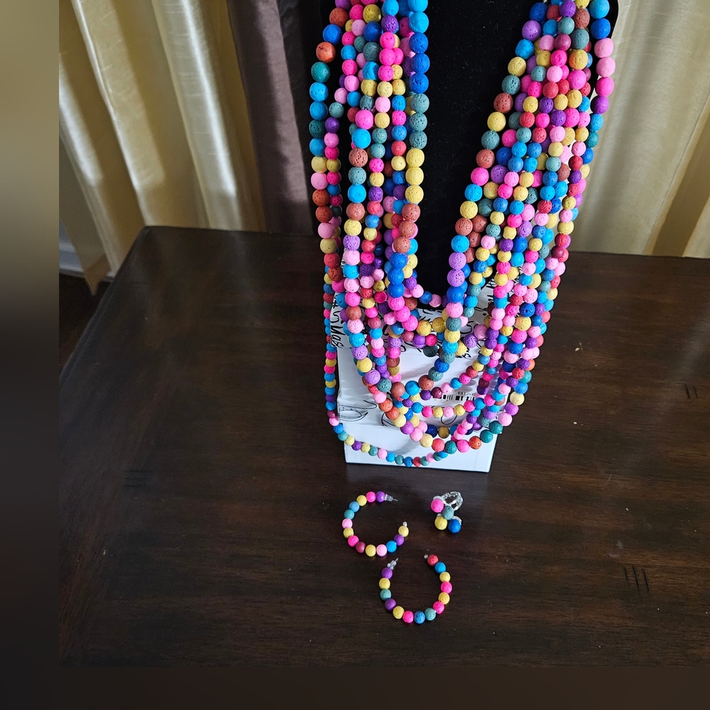 Makemba ( non detachable) 10 strand bib, medium hoops & adjustable ring set